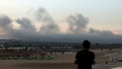 Smoke billows over southern Lebanon following Israeli strikes, amid ongoing cross-border hostilities between Hezbollah and Israeli forces, as seen from Tyre, southern Lebanon, Sept. 23, 2024. 