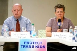 FILE - Amy Allen, the mother of an eighth-grade transgender son, speaks at a Human Rights Campaign roundtable discussion on anti-transgender laws, in Nashville, Tenn., May 21, 2021.