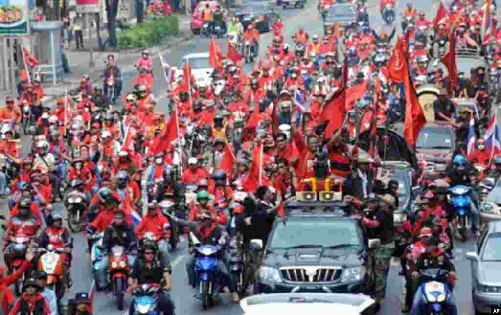Red-shirt supporters of deposed Thai premier Thaksin Shinawatra take part in an anti-government protest in Bangkok on March 20, 2010.