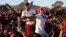 Opposition party supporters cheer opposition challenger Nelson Chamisa at a campaign rally in Bindura, Zimbabwe, July 27, 2018. 