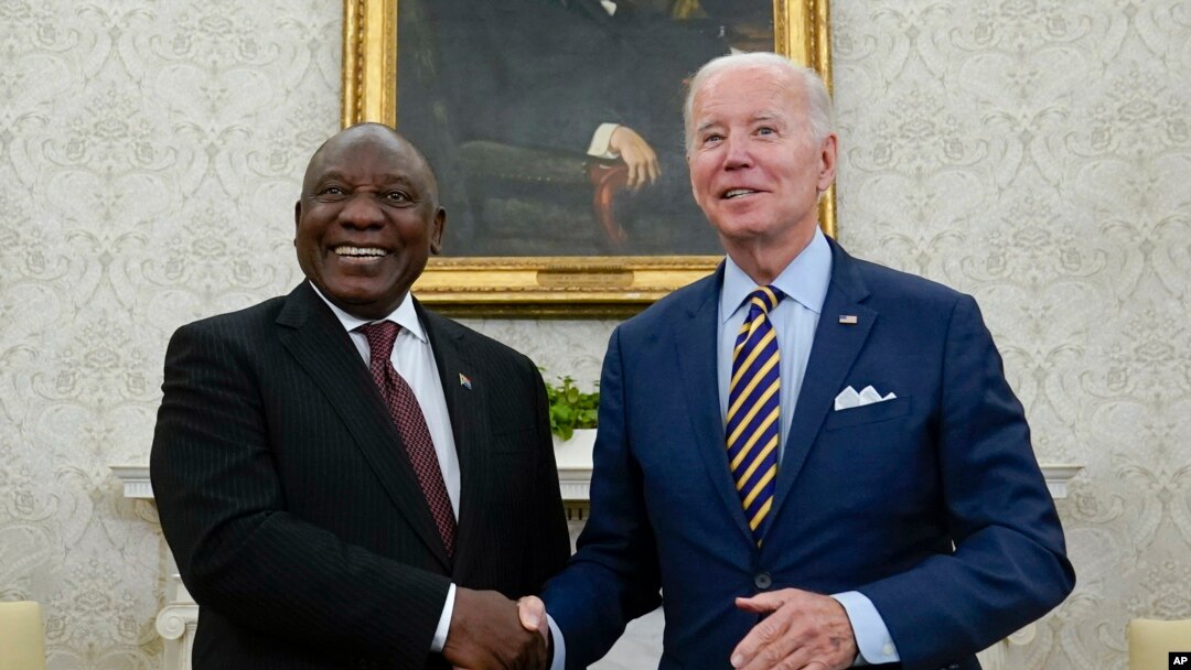 FILE - US President Joe Biden shakes hands with South African President Cyril Ramaphosa as they meet in the Oval Office of the White House, Friday, Sept. 16, 2022, in Washington. South Africa is an active partner in the African Growth and Opportunity Act.
