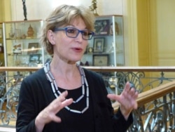 FILE - Agnes Callamard, the U.N. special rapporteur for extrajudicial, summary and arbitrary executions, speaks to reporters at the U.N. human rights office in Geneva, June 19, 2019.