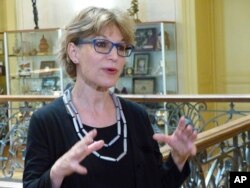 FILE - Agnes Callamard, the U.N. special rapporteur for extrajudicial, summary and arbitrary executions, speaks to reporters at the U.N. human rights office in Geneva, June 19, 2019.