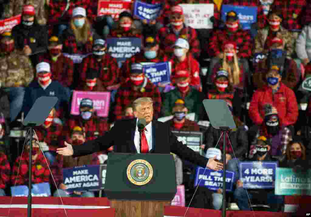 FILE - President Donald Trump speaks during a campaign rally in Duluth, Minnesota, Sept. 30, 2020.