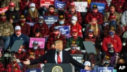 FILE - President Donald Trump speaks during a campaign rally in Duluth, Minnesota, Sept. 30, 2020.