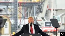 FILE - In this June 11, 2019, file photo, President Donald Trump speaks at Southwest Iowa Renewable Energy, an ethanol producer in Council Bluffs, Iowa. Trump has repeatedly told U.S. farmers he loves and supports them and in return they largely…