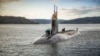 FILE - The Seawolf-class fast-attack submarine USS Connecticut departs Puget Sound Naval Shipyard in this Dec. 15, 2016, photo, provided by the U.S. Navy. 