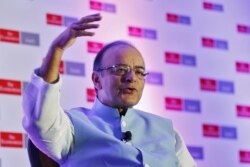 FILE - India's Finance Minister Arun Jaitley speaks at an Economist conference in New Delhi, India, Sept. 9, 2015.