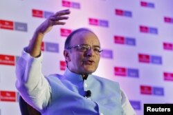 FILE - India's Finance Minister Arun Jaitley speaks at an Economist conference in New Delhi, India, Sept. 9, 2015.