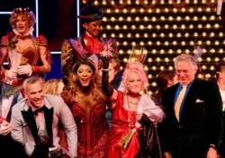 FILE - Jerry Mitchell, Matt Henry, Cyndi Lauper and Harvey Fierstein at the press night opening for "Kinky Boots," in London, Sept. 15, 2015.