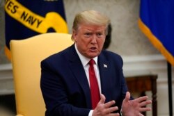 President Donald Trump speaks during a meeting about the coronavirus response in the Oval Office of the White House, May 7, 2020, in Washington.