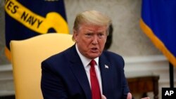 President Donald Trump speaks during a meeting about the coronavirus response in the Oval Office of the White House, May 7, 2020, in Washington. 