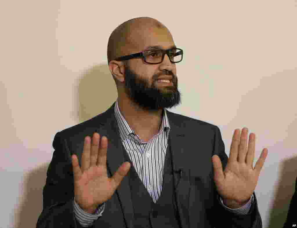 CAGE research director, Asim Qureshi, talks during a press conference saying that he saw strong similarities between the British-accented militant who has appeared in beheading videos and the man identified as Mohammed Emwazi, but because of the hood worn by the militant, &ldquo;there was no way he could be 100 percent certain,&rdquo; Feb. 26, 2015.