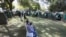 FILE: Members of the public wait to be tested for HIV and AIDS in Harare, Zimbabwe, June, 22, 2012.