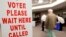 A voter is escorted to a voting machine on Election Day Nov. 8, 2016, in Nashville, Tennessee.