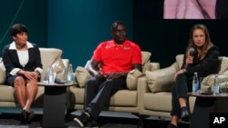 From left, Indian triathlete Pragnya Mohan, former Kenyan runner David Rudisha, and New Zealand soccer player Katie Rood attend a session on sports for climate action during the COP29 U.N. Climate Summit, in Baku, Azerbaijan, Nov. 18, 2024.