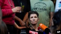 FILE - Yocheved Lifshitz, 85, who was held hostage in Gaza after being abducted during Hamas' bloody Oct. 7 attack on Israel, speaks to members of the press a day after being released by Hamas militants, at Ichilov Hospital in Tel Aviv, Israel, Oct. 24, 2023.