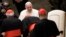 Pope Francis greets cardinals in the Paul VI Hall at the Vatican after an audience with students and teachers of the LUMSA Catholic University, Nov. 14, 2019.
