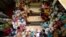 Relatives of seventeen children who died after a gas cylinder exploded on a school bus, mourn over their coffins, on the outskirts of Gujrat, 100 miles (170 km) southeast of Islamabad, May 25, 2013. The children were on their way to school when the incide
