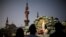 Expat worshippers pray in front of St. Mary's shrine at St. Mary's Catholic Church in Oud Metha, as Catholics await a historic visit by Pope Francis to the United Arab Emirates, in Dubai, UAE, Jan. 18, 2019.