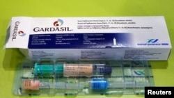 FILE - An illustration picture shows a Gardasil anti-cervical cancer vaccine box displayed at a pharmacy in Strasbourg, France, Nov. 25, 2013. 