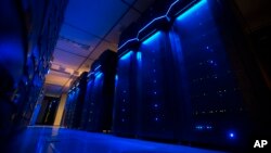 FILE - A photo shows server banks inside a data center at AEP utility headquarters in Columbus, Ohio, May 20, 2015.