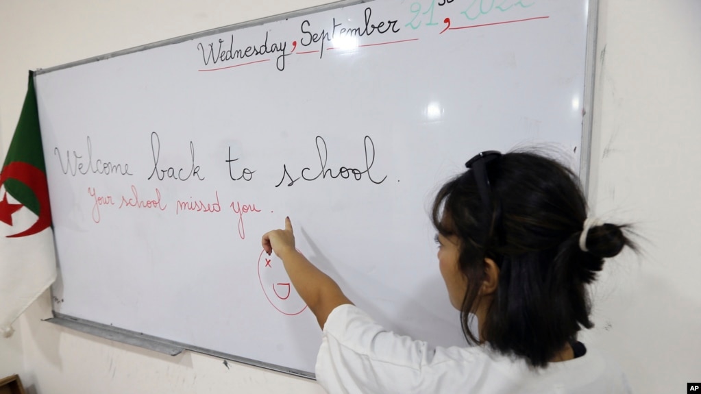 FILE - A teacher gives an English lesson in a private school of Birkhadem, outside Algiers, Wednesday, Sept.21, 2022. English proficiency in Algeria has remained stable since 2021. (AP Photo/Fateh Guidoum)