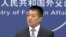 FILE - Lu Kang, spokesman of the Chinese Ministry of Foreign Affairs, speaks to reporters about the international tribunal's ruling on the South China Sea during a news briefing in Beijing, July 12, 2016.
