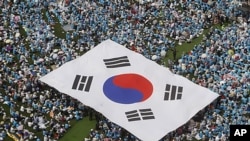 韩国民众6月6日举行大型反对朝鲜集会纪念国殇日