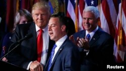 U.S. President elect Donald Trump shakes hands with Republican National Committee Chairman Reince Priebus (C) as Vice President-elect Mike Pence (R) looks onat election night rally in Manhattan, New York, Nov. 9, 2016. 