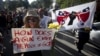 FILE - People take part in "Black Lives Matter" march around Emanuel African Methodist Episcopal Church in Charleston, June 20, 2015. 