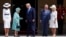 Britain's Queen Elizabeth II greets President Donald Trump, center, and first lady Melania Trump, left, with Britain's Prince Charles and Camilla, Duchess of Cornwall during a ceremonial welcome in the garden of Buckingham Palace in London, June 3, 2019.