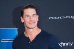 FILE - Actor John Cena attends the Road to "Fast &amp; Furious 9" Concert at Maurice A. Ferre Park in&nbsp;Miami&nbsp;Beach, Fla.