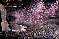 FILE - Balloons fall after Republican Presidential Candidate Donald Trump, addresses the delegates during the final day of the Republican National Convention in Cleveland, July 21, 2016.