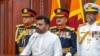 This handout photograph taken and released by the Sri Lanka President's Office on Sept. 23, 2024 shows Sri Lanka's new President Anura Kumara Dissanayake attending his swearing-in ceremony, in Colombo. 