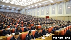 Attendees are seen during the 5th Plenary Meeting of the 7th Central Committee of the Workers' Party of Korea in this undated photo released Dec. 29, 2019, by the Korean Central News Agency.