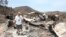 Steve Keeling walks through the ashes of his fire ravaged home in South Lake, California, June 27, 2016. 