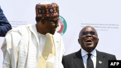 Shugaban Najeriya Muhammadu Buhari da na kasar Ghana Nana Akufor Addo a wajen Taron ECOWAS na 52