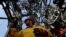 FILE - An employee works at a deep-water oil platform in the Gulf of Mexico off the coast of Veracruz, Mexico, Jan. 17, 2014.