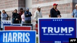 Voters line up to cast their ballots at a polling station at Farmersville Elementary School on Election Day in Bethlehem, Pennsylvania, Nov. 5, 2024.