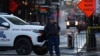 A state trooper stands by New Orleans' Canal and Bourbon streets, Jan. 2, 2025.