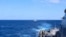 美国海军伯克级导弹驱逐舰“约翰·芬恩”号与菲律宾海军护卫舰在南中国海菲律宾专属经济区举行的“海上合作行动”中编队航行。(2026年1月26日)
