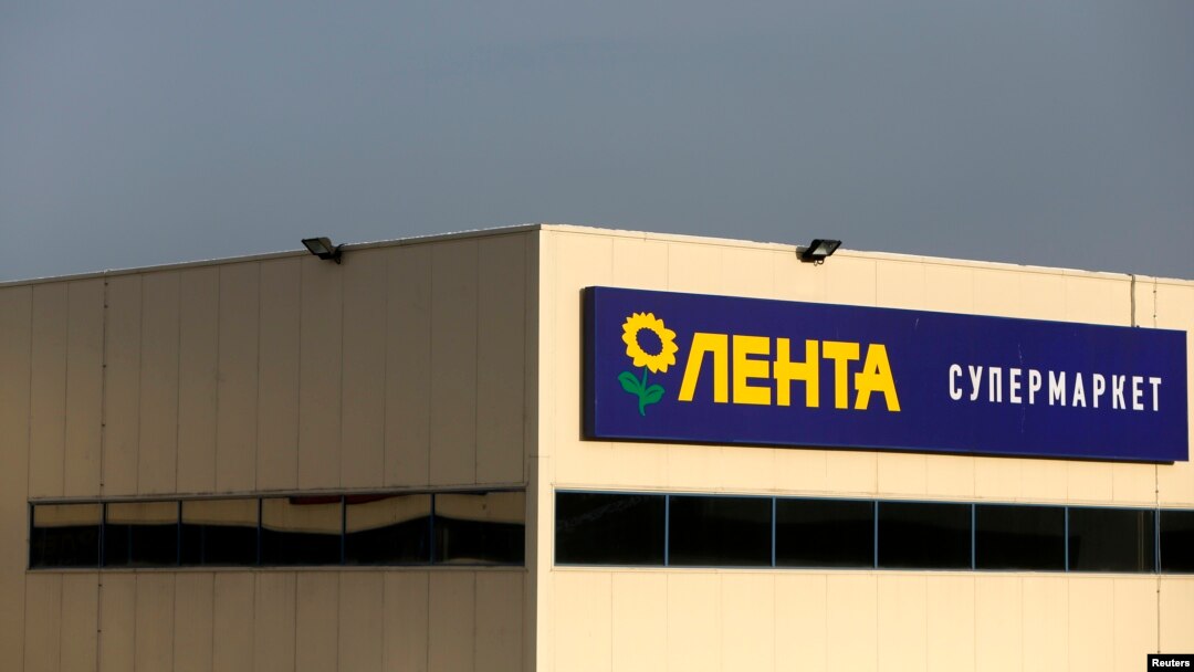 A Lenta supermarket sign is pictured in Moscow. Russian hypermarket chain Lenta, part-owned by U.S. private equity firm TPG, has set a price range for its planned London market debut, which implies a market valuation of up to $5 billion, Feb. 3, 2014.