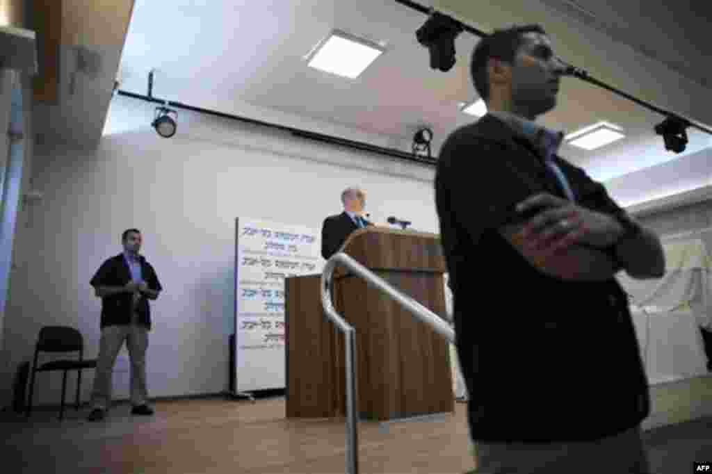 Israeli Prime Minister Benjamin Netanyahu, center, speaks to the media in Tel Aviv, Israel, Monday, Nov. 29, 2010. A U.S. diplomatic cable released by Wikileaks suggests that Israel told Palestinian leaders and Egypt that it was going to attack the Gaza S