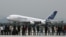 FILE - An Airbus A380 lands at the Guangzhou Baiyun International airport in Guangzhou, in China's southern Guangdong province.