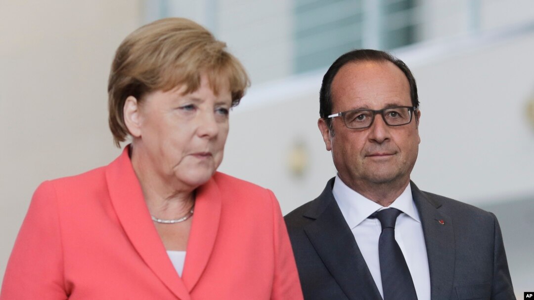 Nemačka kancelarka Angela Merkel i francuski predsednik Fransoa Oland prilikom susreta u Berlinu 24. avgusta 2015. 