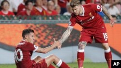 Philippe Coutinho iyo Alberto Moreno