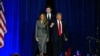 Former U.S. President and Republican presidential candidate Donald Trump arrives for an election night event alongside former First Lady Melania Trump and his son Barron Trump at the West Palm Beach Convention Center in West Palm Beach, Florida, Nov. 6, 2024.