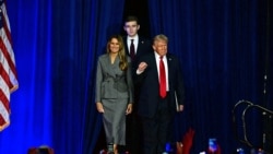 Former U.S. President and Republican presidential nominee Donald Trump arrives for an election night event alongside former first lady Melania Trump and their son Barron Trump at the West Palm Beach Convention Center in West Palm Beach, Florida, Nov. 6, 2024.