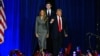 Former U.S. President and Republican presidential candidate Donald Trump arrives for an election night event alongside former First Lady Melania Trump and his son Barron Trump at the West Palm Beach Convention Center in West Palm Beach, Florida, Nov. 6, 2024.